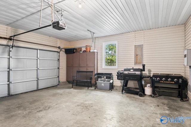 garage featuring a garage door opener