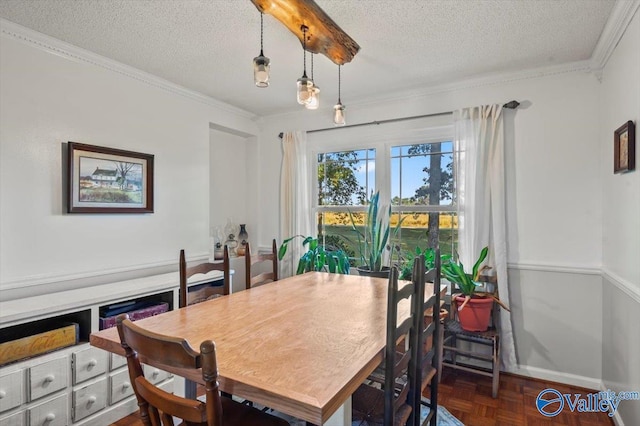 dining room featuring crown molding and a textured ceiling