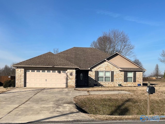 single story home featuring a garage