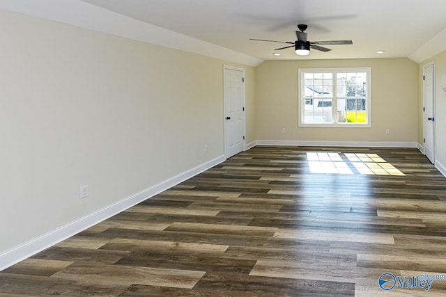 unfurnished room featuring ceiling fan and dark hardwood / wood-style flooring