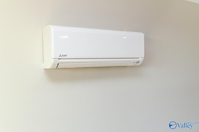 room details featuring a wall mounted AC