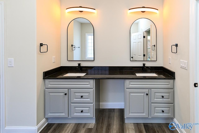 bathroom featuring hardwood / wood-style floors and vanity