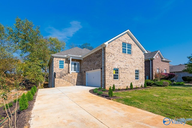 view of front of home featuring a front yard and a garage