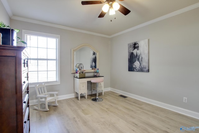 interior space with ceiling fan, ornamental molding, and light hardwood / wood-style flooring