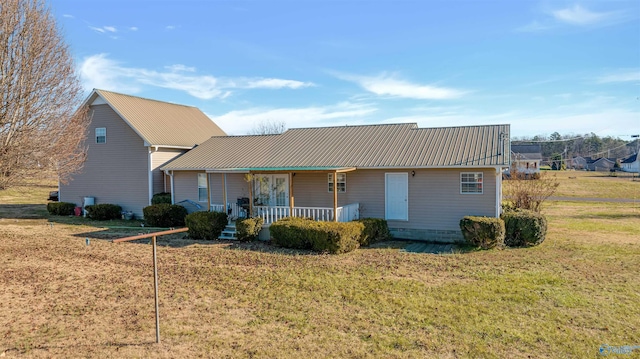 ranch-style home with a porch and a front lawn