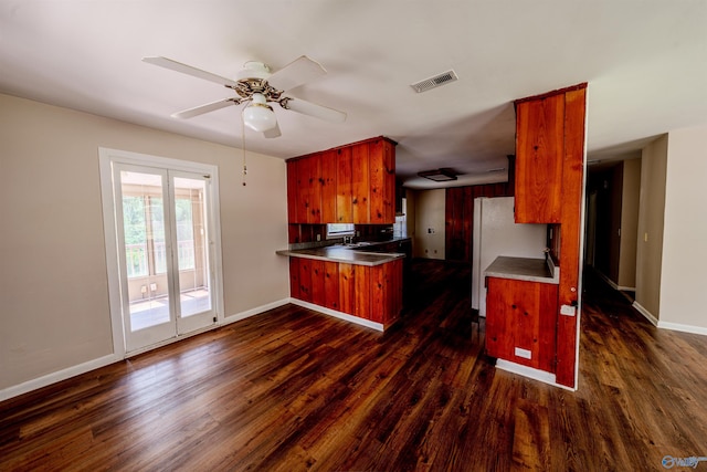 2551 Little Creek Rd, Arab, AL 35016 - kitchen featuring dark wood finished floors, freestanding refrigerator, a peninsula, ceiling fan, and baseboards