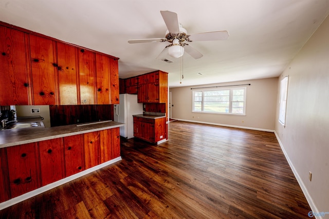 2551 Little Creek Rd, Arab, AL 35016 - kitchen featuring freestanding refrigerator, dark wood-type flooring, baseboards, and ceiling fan