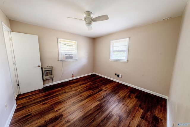 2551 Little Creek Rd, Arab, AL 35016 - unfurnished bedroom with heating unit, dark wood-style flooring, baseboards, cooling unit, and ceiling fan