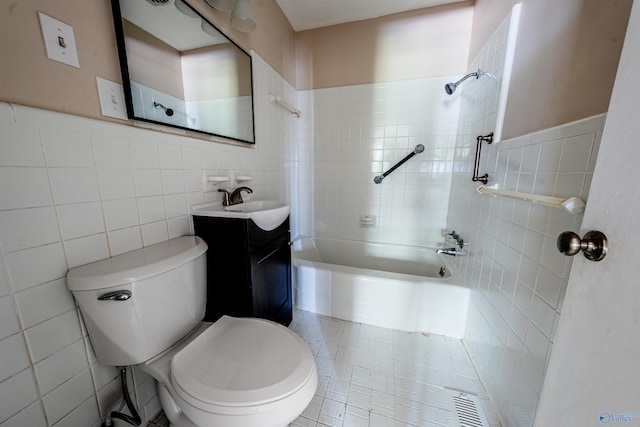 2551 Little Creek Rd, Arab, AL 35016 - bathroom with tile walls, tub / shower combination, toilet, vanity, and pet washing area