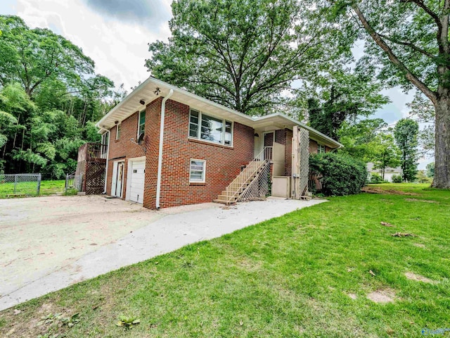 2551 Little Creek Rd, Arab, AL 35016 - view of front of property with an attached garage, concrete driveway, brick siding, and stairs