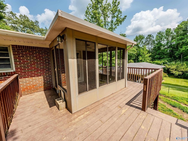 2551 Little Creek Rd, Arab, AL 35016 - wooden deck featuring a sunroom