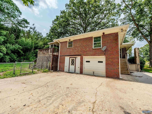2551 Little Creek Rd, Arab, AL 35016 - view of front of house featuring stairs, brick siding, concrete driveway, and an attached garage