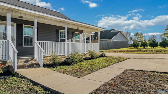 property entrance with covered porch