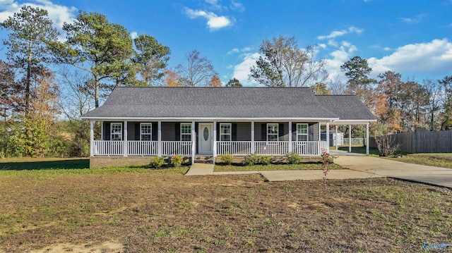 view of front of home featuring a front lawn and a porch