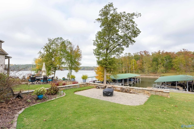 exterior space featuring a dock and a water view