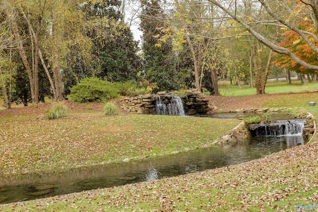 view of yard with a water view