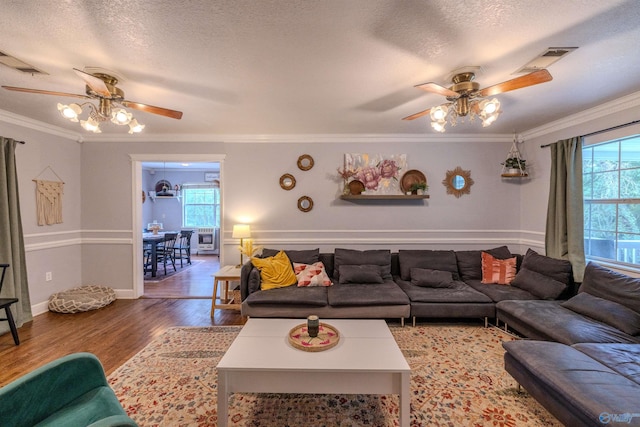 610 Grover Davis Rd, Hamilton, AL 35570 - living room with a ceiling fan, wood finished floors, ornamental molding, a textured ceiling, and baseboards