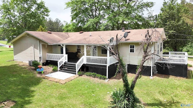 610 Grover Davis Rd, Hamilton, AL 35570 - back of property featuring a lawn, a porch, and roof with shingles