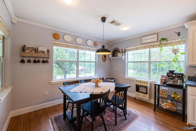 610 Grover Davis Rd, Hamilton, AL 35570 - dining area with heating unit, ornamental molding, baseboards, and wood finished floors