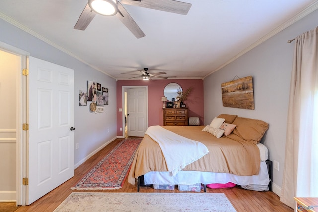 610 Grover Davis Rd, Hamilton, AL 35570 - bedroom featuring wood finished floors, crown molding, baseboards, and ceiling fan