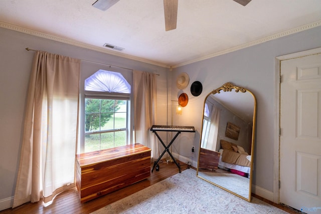 610 Grover Davis Rd, Hamilton, AL 35570 - bedroom featuring wood finished floors, crown molding, baseboards, and a ceiling fan