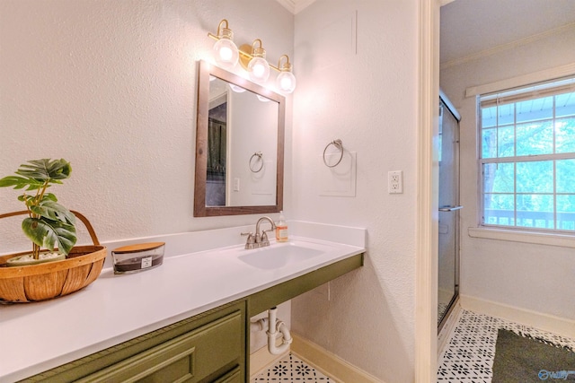 610 Grover Davis Rd, Hamilton, AL 35570 - bathroom with a stall shower, crown molding, baseboards, a sink, and a textured wall