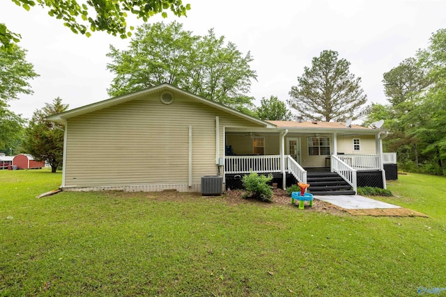 610 Grover Davis Rd, Hamilton, AL 35570 - back of house with a lawn, covered porch, and central AC unit