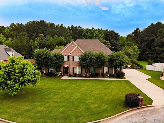 view of front of house with a front lawn