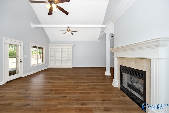 unfurnished living room featuring a fireplace, baseboards, and ceiling fan