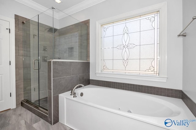 bathroom featuring a garden tub, crown molding, and a stall shower