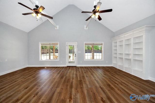 unfurnished living room featuring a ceiling fan, wood finished floors, and high vaulted ceiling