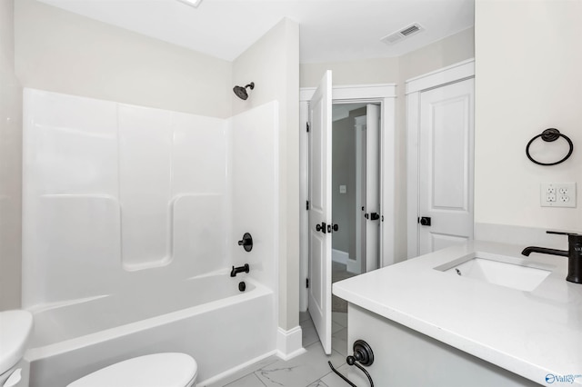 full bathroom with vanity, toilet, and washtub / shower combination