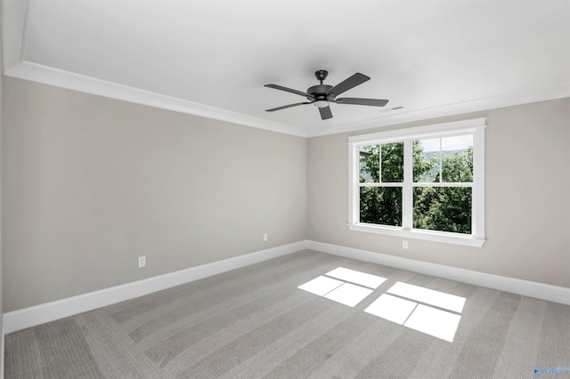 empty room featuring light carpet and ceiling fan