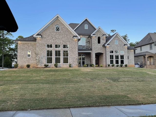 view of front of property with a front lawn