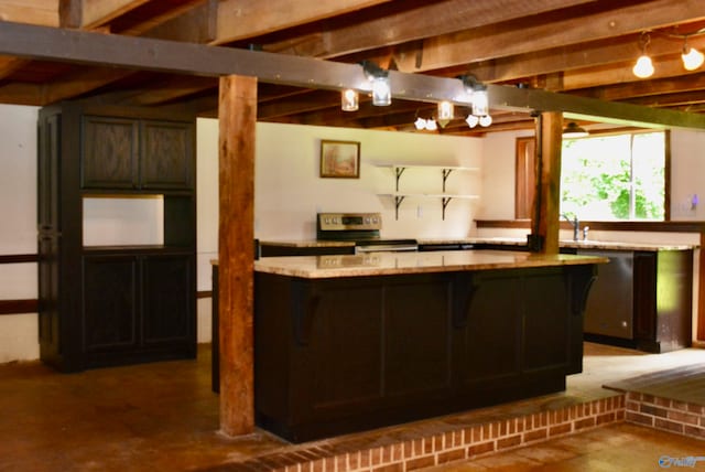 kitchen featuring dark brown cabinetry, stove, dishwasher, and beam ceiling