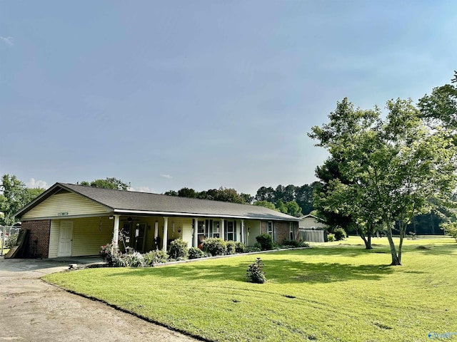 1212 Twin Lake Cir SW, Hartselle, AL 35640 - single story home with driveway, an attached carport, brick siding, and a ceiling fan