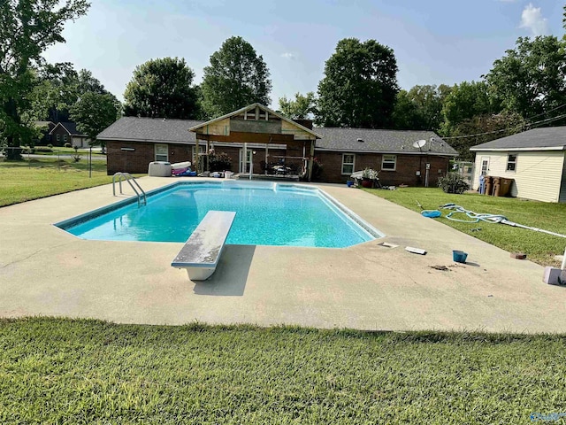 1212 Twin Lake Cir SW, Hartselle, AL 35640 - outdoor pool featuring a patio area, a yard, and a diving board