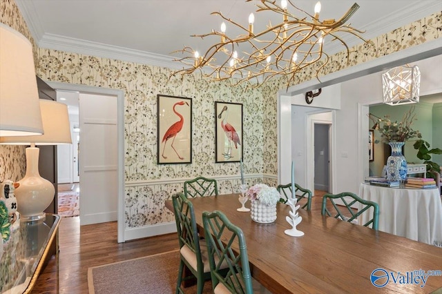 dining area with wallpapered walls, baseboards, ornamental molding, and wood finished floors