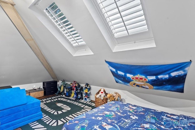 bedroom featuring vaulted ceiling