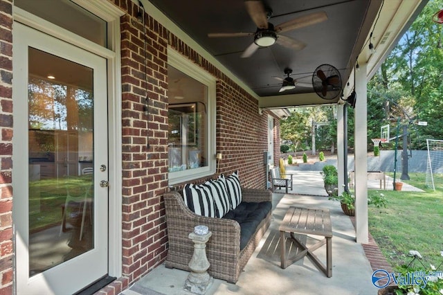 view of patio featuring ceiling fan