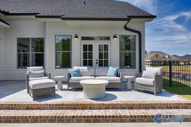 view of patio featuring french doors and an outdoor living space