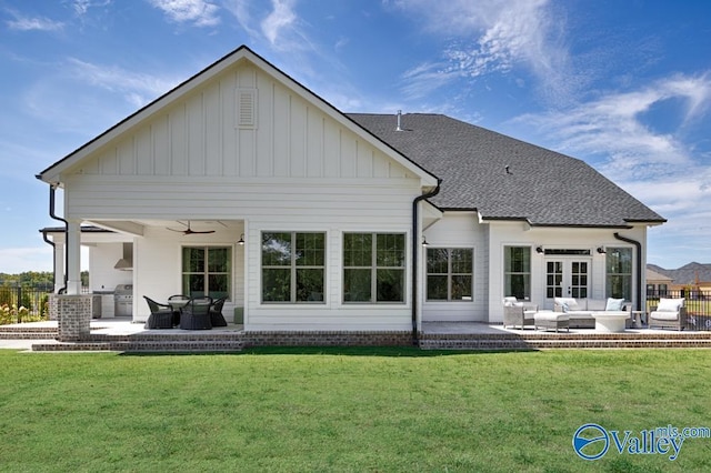 2106 Forest Gate SW, Huntsville, AL 35802 - rear view of house with an outdoor living space, a yard, and a patio