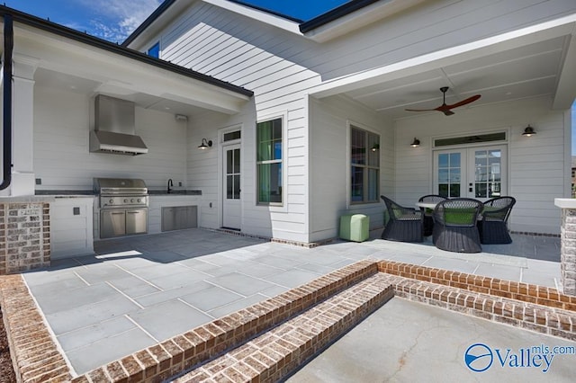 2106 Forest Gate SW, Huntsville, AL 35802 - view of patio with a ceiling fan, a sink, exterior kitchen, grilling area, and french doors