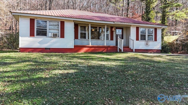 view of front of house with covered porch, cooling unit, and a front lawn