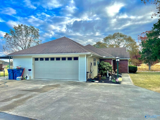 ranch-style home with a garage