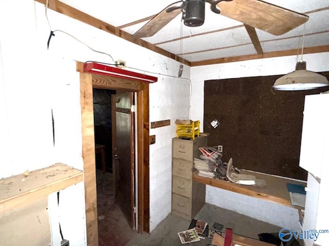 misc room with concrete flooring