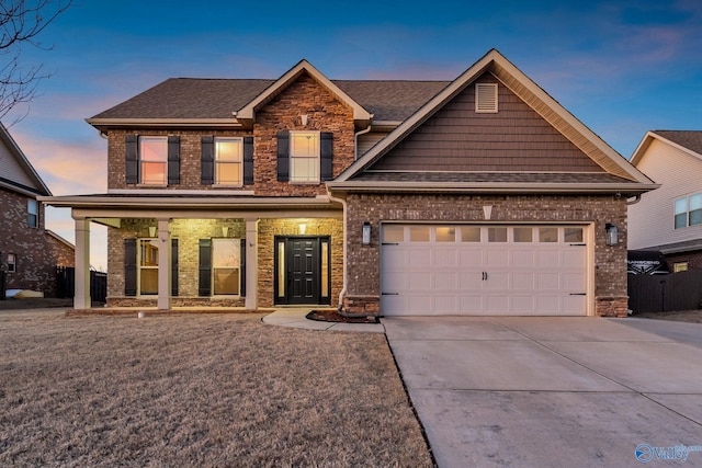 craftsman inspired home with a garage