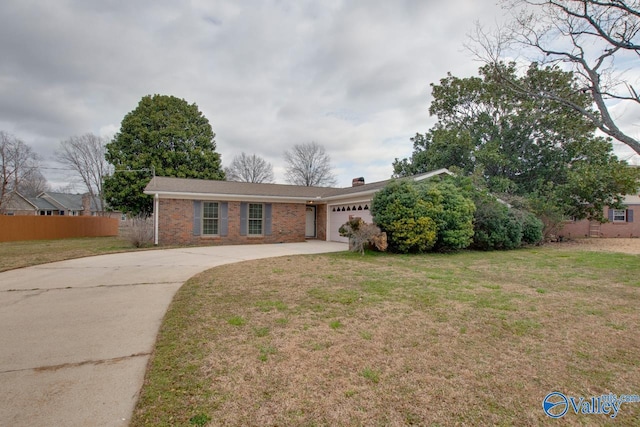 single story home featuring a front lawn, driveway, fence, a garage, and brick siding