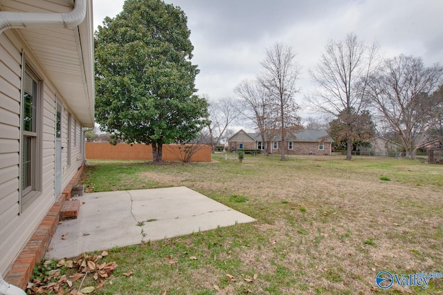 view of yard featuring a patio area and fence