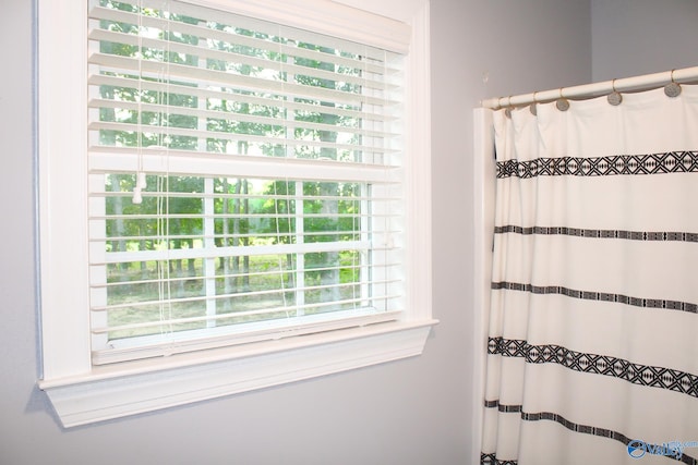 bathroom featuring walk in shower